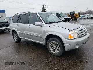 2005 Suzuki XL7 LX z VIN JS3TX92V054108383, wystawiony jako Copart lot #85280414 z przebiegiem 128 594 mil mil oraz Szkoda całkowita • Salvage title. Historia ofert i sprzedaży dostępna na DreamBid. Obrazek 4.