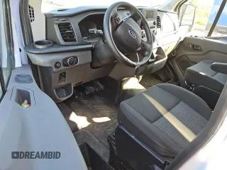 2023 Ford Transit Cargo with VIN 1FTBR1Y86PKA17978, listed as a Copart auction lot 77180324 with 20,173 mi miles and Clean Title. Bid and sale history available at DreamBid. Image 8.