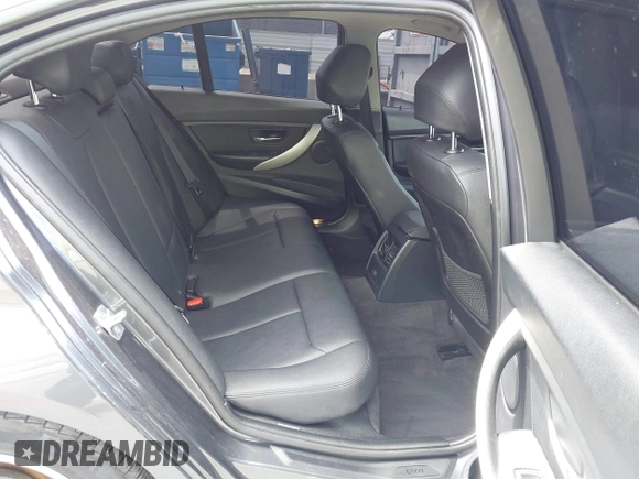 2014 BMW 3 Series 320i xDrive with VIN WBA3C3C58EP661414, listed as a IAAI auction lot 42489010 with 93,488 mi miles and . Bid and sale history available at DreamBid. Image 8.