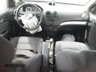2007 Chevrolet Aveo LS z VIN KL1TD56627B175107, wystawiony jako Copart lot #51242365 z przebiegiem Nie podano mil oraz Szkoda całkowita • Salvage title. Historia ofert i sprzedaży dostępna na DreamBid. Obrazek 8.