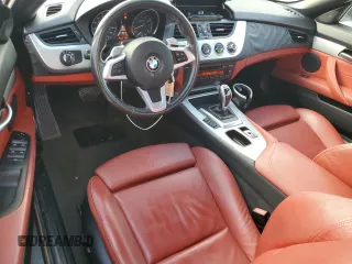 2011 BMW Z4 sDrive35i with VIN WBALM7C55BE382692, listed as a Copart auction lot 84460034 with 112,322 mi miles and Salvage Title. Bid and sale history available at carsss.com. Image 8.