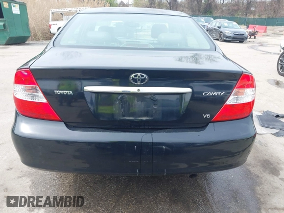 2004 Toyota Camry LE with VIN 4T1BF30K34U080477, listed as a IAAI auction lot 41956998 with 135,441 mi miles. Bid and sale history available at carsss.com. Image 16.