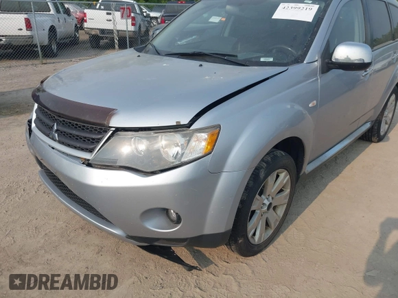 2009 Mitsubishi Outlander SE with VIN JA4LT31W09Z014816, listed as a IAAI auction lot 42399219 with 188,136 mi miles and . Bid and sale history available at DreamBid. Image 6.