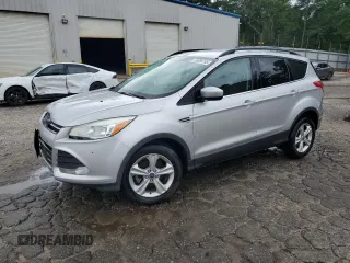 2013 Ford Escape SE with VIN 1FMCU0GX7DUA57262, listed as a Copart auction lot 59088705 with 157,201 mi miles and Salvage title. Bid and sale history available at DreamBid. Image 1.