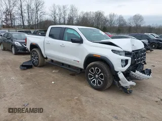 2024 GMC Canyon 4WD AT4 with VIN 1GTP6DEK1R1230068, listed as a IAAI auction lot 41491052 with 2,058 mi miles. Bid and sale history available at carsss.com. Image 1.