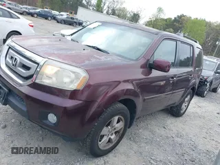 2011 Honda Pilot EX-L with VIN 5FNYF3H61BB050776, listed as a IAAI auction lot 41934621 with 172,424 mi miles and . Bid and sale history available at DreamBid. Image 14.