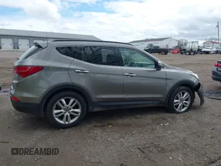 2013 Hyundai Santa Fe Sport z VIN 5XYZUDLA3DG114436, wystawiony jako IAAI lot #42084871 z przebiegiem 96 000 mil mil oraz . Historia ofert i sprzedaży dostępna na DreamBid. Obrazek 13.