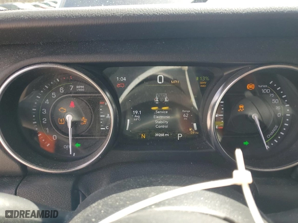 2021 Jeep Wrangler 4xe Unlimited Sahara with VIN 1C4JJXP61MW644758, listed as a Copart auction lot 50034335 with 39,268 mi miles and Salvage Title. Bid and sale history available at carsss.com. Image 9.