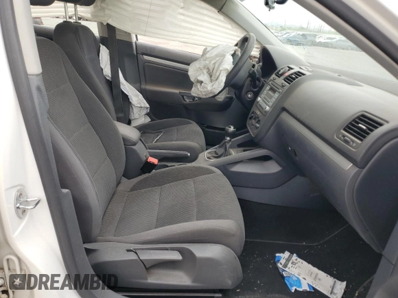 2009 Volkswagen Jetta S with VIN 3VWJM71K69M035974, listed as a Copart auction lot 56979765 with Not provided miles and Salvage title. Bid and sale history available at DreamBid. Image 7.