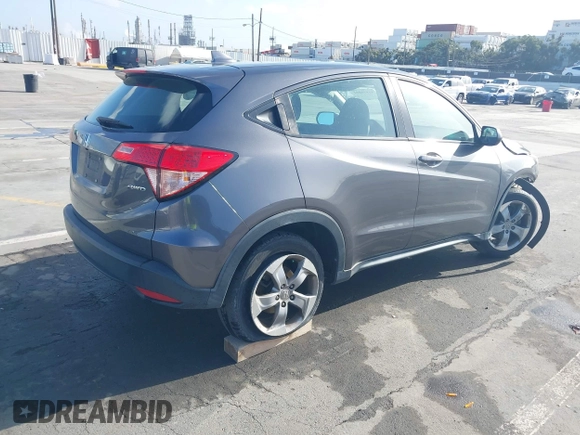 2018 Honda HR-V LX with VIN 3CZRU6H35JG719653, listed as a IAAI auction lot 41956051 with 74,307 mi miles. Bid and sale history available at carsss.com. Image 4.