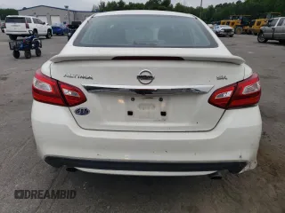 2016 Nissan Altima SR z VIN 1N4AL3AP1GN314106, wystawiony jako Copart lot #52213484 z przebiegiem 112 158 mil mil oraz Szkoda całkowita • Salvage title. Historia ofert i sprzedaży dostępna na DreamBid. Obrazek 6.