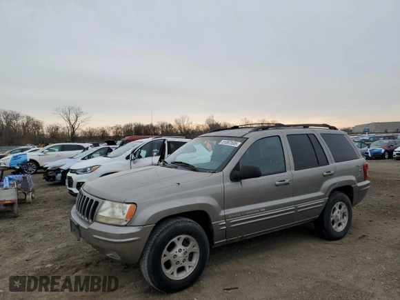 1999 Jeep Grand Cherokee Limited with VIN 1J4GW68SXXC582343, listed as a Copart auction lot 51067695 with 157,456 mi miles and Clean Title. Bid and sale history available at carsss.com. Image 1.