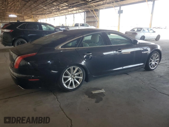 2013 Jaguar XJ z VIN SAJWA1C77D8V40055, wystawiony jako Copart lot #60461395 z przebiegiem 102 709 mil mil oraz Czysty tytuł • Clean title. Historia ofert i sprzedaży dostępna na DreamBid. Obrazek 3.