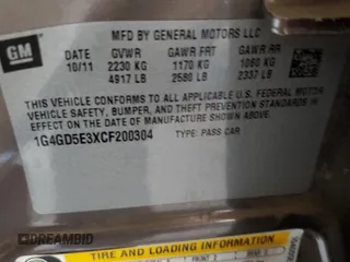 2012 Buick LaCrosse Premium 1 with VIN 1G4GD5E3XCF200304, listed as a Copart auction lot 64322365 with 157,259 mi miles and Salvage title. Bid and sale history available at DreamBid. Image 12.