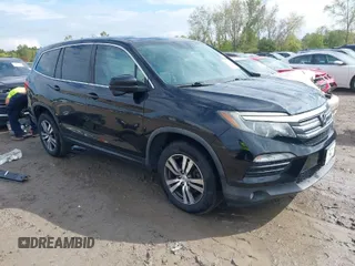 2016 Honda Pilot EX-L with VIN 5FNYF6H5XGB031594, listed as a IAAI auction lot 40409867 with 132,227 mi miles. Bid and sale history available at carsss.com. Image 1.