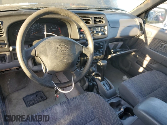 1999 Nissan Frontier XE with VIN 1N6ED26Y4XC322021, listed as a Copart auction lot 82690214 with 102,758 mi miles and Clean title. Bid and sale history available at DreamBid. Image 8.