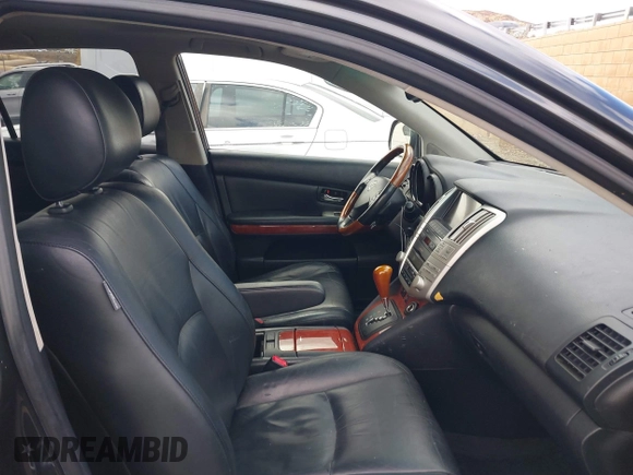 2008 Lexus RX 400h with VIN JTJGW31U382850234, listed as a IAAI auction lot 41556774 with 124,697 mi miles and . Bid and sale history available at DreamBid. Image 5.