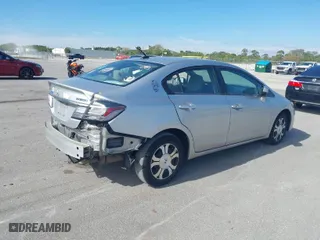 2014 Honda Civic Hybrid with VIN 19XFB4F23EE001744, listed as a IAAI auction lot 41261440 with 196,201 mi miles. Bid and sale history available at carsss.com. Image 4.
