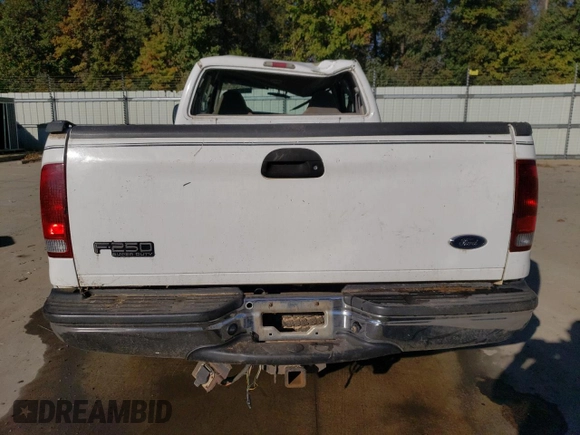 2001 Ford F-250 XL with VIN 1FTNX21L31EA53026, listed as a Copart auction lot 75316914 with 288,919 mi miles and Salvage title. Bid and sale history available at DreamBid. Image 6.