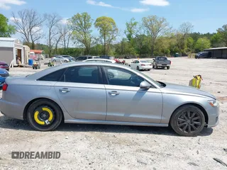 2016 Audi A6 Premium z VIN WAUCFAFC2GN111968, wystawiony jako IAAI lot #42003738 z przebiegiem 149 089 mil mil oraz . Historia ofert i sprzedaży dostępna na DreamBid. Obrazek 13.