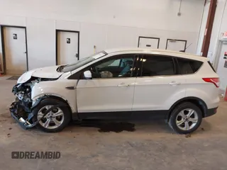2016 Ford Escape SE z VIN 1FMCU9G97GUC76913, wystawiony jako IAAI lot #42085125 z przebiegiem 137 001 mil mil oraz . Historia ofert i sprzedaży dostępna na DreamBid. Obrazek 14.