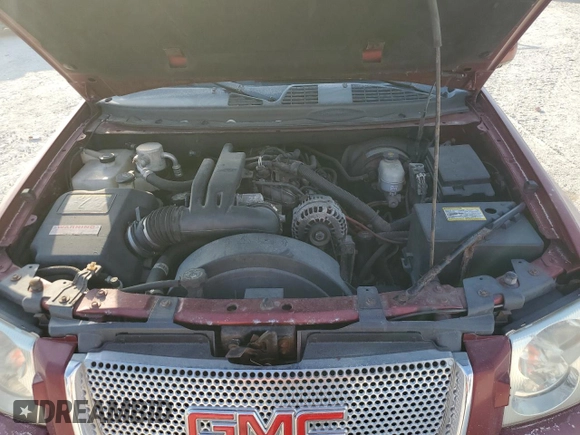 2006 GMC Envoy Denali z VIN 1GKET63M662302568, wystawiony jako Copart lot #44678975 z przebiegiem Nie podano mil oraz Szkoda całkowita • Salvage title. Historia ofert i sprzedaży dostępna na DreamBid. Obrazek 12.