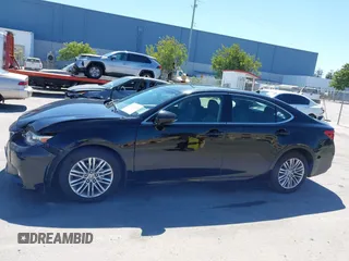 2014 Lexus ES 330 z VIN JTHBK1GG6E2151432, wystawiony jako IAAI lot #42327631 z przebiegiem 179 535 mil mil oraz . Historia ofert i sprzedaży dostępna na DreamBid. Obrazek 14.