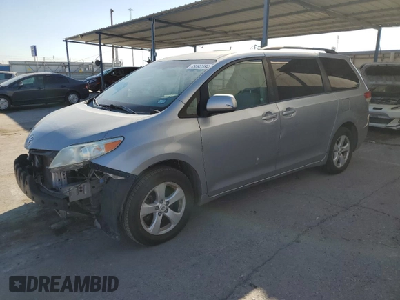 2012 Toyota Sienna LE AAS with VIN 5TDKK3DC8CS259085, listed as a Copart auction lot 73592584 with 198,370 mi miles and Salvage Title. Bid and sale history available at DreamBid. Image 1.