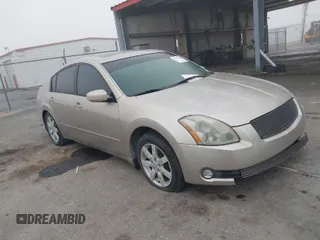 2005 Nissan Maxima 3.5 SL with VIN 1N4BA41E65C859869, listed as a IAAI auction lot 41528302 with 120,321 mi miles. Bid and sale history available at carsss.com. Image 1.