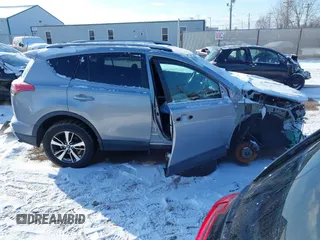 2018 Toyota RAV4 XLE with VIN 2T3RFREV8JW753853, listed as a IAAI auction lot 41526071 with 104,642 mi miles. Bid and sale history available at carsss.com. Image 14.