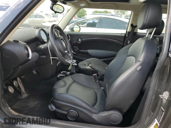 2012 MINI Hardtop S with VIN WMWSV3C53CTY25517, listed as a Copart auction lot 62315535 with 50,680 mi miles and Salvage title. Bid and sale history available at DreamBid. Image 7.