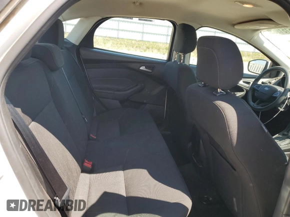 2018 Ford Focus SE with VIN 1FADP3FE0JL227146, listed as a Copart auction lot 56151985 with 124,517 mi miles and Salvage title. Bid and sale history available at DreamBid. Image 10.