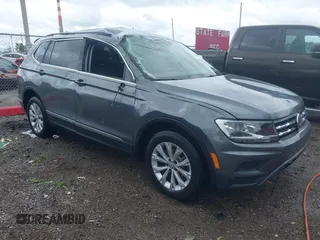 2018 Volkswagen Tiguan SEL z VIN 3VV3B7AX6JM213577, wystawiony jako IAAI lot #42303230 z przebiegiem 30 328 mil mil oraz . Historia ofert i sprzedaży dostępna na DreamBid. Obrazek 1.