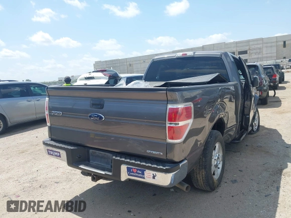 2014 Ford F-150 XL with VIN 1FTMF1CM0EFA43441, listed as a IAAI auction lot 42526218 with 232,421 mi miles and . Bid and sale history available at DreamBid. Image 4.