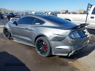 2021 Ford Mustang GT with VIN 1FA6P8CF0M5148961, listed as a IAAI auction lot 42211976 with 14,181 mi miles and . Bid and sale history available at DreamBid. Image 3.