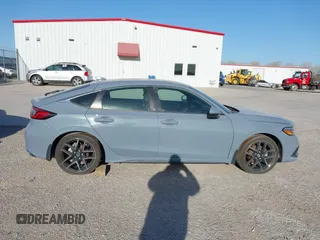 2022 Honda Civic Sport Touring z VIN 19XFL1G89NE009751, wystawiony jako IAAI lot #41845803 z przebiegiem Nie podano mil oraz . Historia ofert i sprzedaży dostępna na DreamBid. Obrazek 12.
