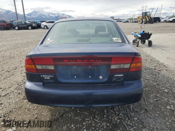 2003 Subaru Legacy L with VIN 4S3BE635337206073, listed as a Copart auction lot 54269664 with 206,230 mi miles and Salvage title. Bid and sale history available at DreamBid. Image 6.