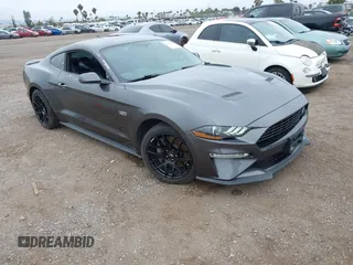 2020 Ford Mustang EcoBoost with VIN 1FA6P8TD1L5184204, listed as a IAAI auction lot 42421848 with 94,492 mi miles and . Bid and sale history available at DreamBid. Image 1.