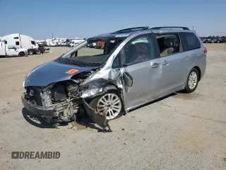 2014 Toyota Sienna XLE z VIN 5TDYK3DC1ES491024, wystawiony jako Copart lot #59778085 z przebiegiem 180 295 mil mil oraz Szkoda całkowita • Salvage title. Historia ofert i sprzedaży dostępna na DreamBid. Obrazek 1.