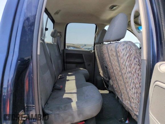2006 Dodge 1500 SLT z VIN 1D7HU18256S651808, wystawiony jako Copart lot #60377465 z przebiegiem 288 470 mil mil oraz Czysty tytuł • Clean title. Historia ofert i sprzedaży dostępna na DreamBid. Obrazek 10.