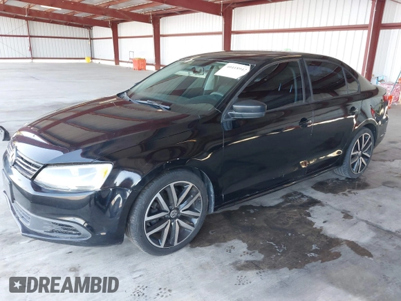 2014 Volkswagen Jetta S z VIN 3VW2K7AJ1EM311148, wystawiony jako IAAI lot #40418942 z przebiegiem 192 015 mil mil oraz . Historia ofert i sprzedaży dostępna na DreamBid. Obrazek 2.