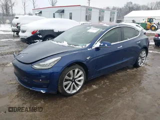 2018 Tesla Model 3 Long Range Battery z VIN 5YJ3E1EA5JF006370, wystawiony jako IAAI lot #41565266 z przebiegiem 55 376 mil mil oraz . Historia ofert i sprzedaży dostępna na DreamBid. Obrazek 17.