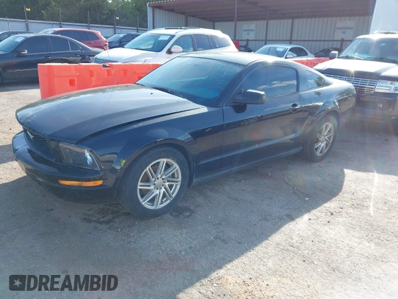 2007 Ford Mustang Deluxe с VIN 1ZVFT80N975339457, выставлен на аукционе IAAI как лот 42080705 с пробегом 174 771 миль миль и . История ставок и продаж доступна на DreamBid. Изображение 2.