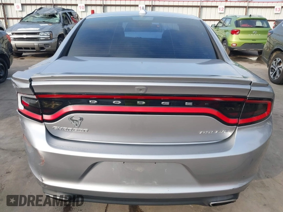 2015 Dodge Charger SXT with VIN 2C3CDXHG4FH884058, listed as a IAAI auction lot 41724894 with 202,701 mi miles and . Bid and sale history available at DreamBid. Image 17.