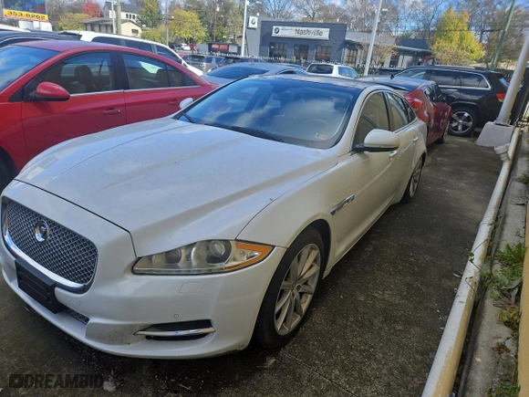 2013 Jaguar XJ with VIN SAJWJ1CD7D8V49599, listed as a Copart auction lot 82354574 with NaN miles and Clean Title. Bid and sale history available at carsss.com. Image 2.