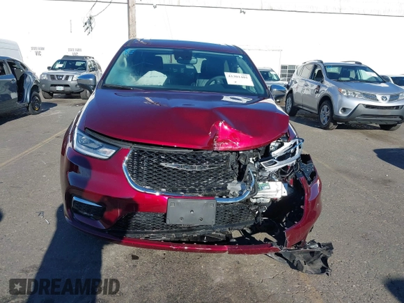 2023 Chrysler Pacifica Hybrid Limited with VIN 2C4RC1S7XPR518695, listed as a IAAI auction lot 41301401 with 24,433 mi miles and . Bid and sale history available at DreamBid. Image 12.