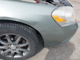 2007 Buick Lucerne CXL with VIN 1G4HD57297U115688, listed as a IAAI auction lot 42016940 with 171,759 mi miles and . Bid and sale history available at DreamBid. Image 13.