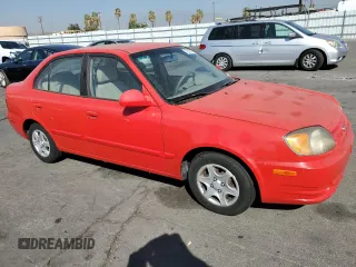 2005 Hyundai Accent GLS with VIN KMHCG45C55U593854, listed as a Copart auction lot 72237914 with 83,203 mi miles and Clean Title. Bid and sale history available at carsss.com. Image 4.
