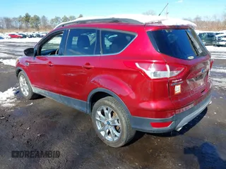 2014 Ford Escape SE with VIN 1FMCU0GX6EUA57609, listed as a IAAI auction lot 41533589 with 96,709 mi miles. Bid and sale history available at carsss.com. Image 3.