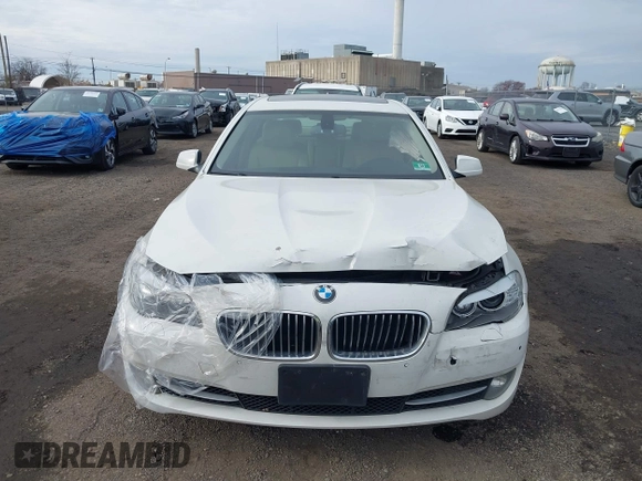 2012 BMW 5 Series 528i xDrive with VIN WBAXH5C53CDW10660, listed as a IAAI auction lot 41016708 with 157,757 mi miles and . Bid and sale history available at carsss.com. Image 12.